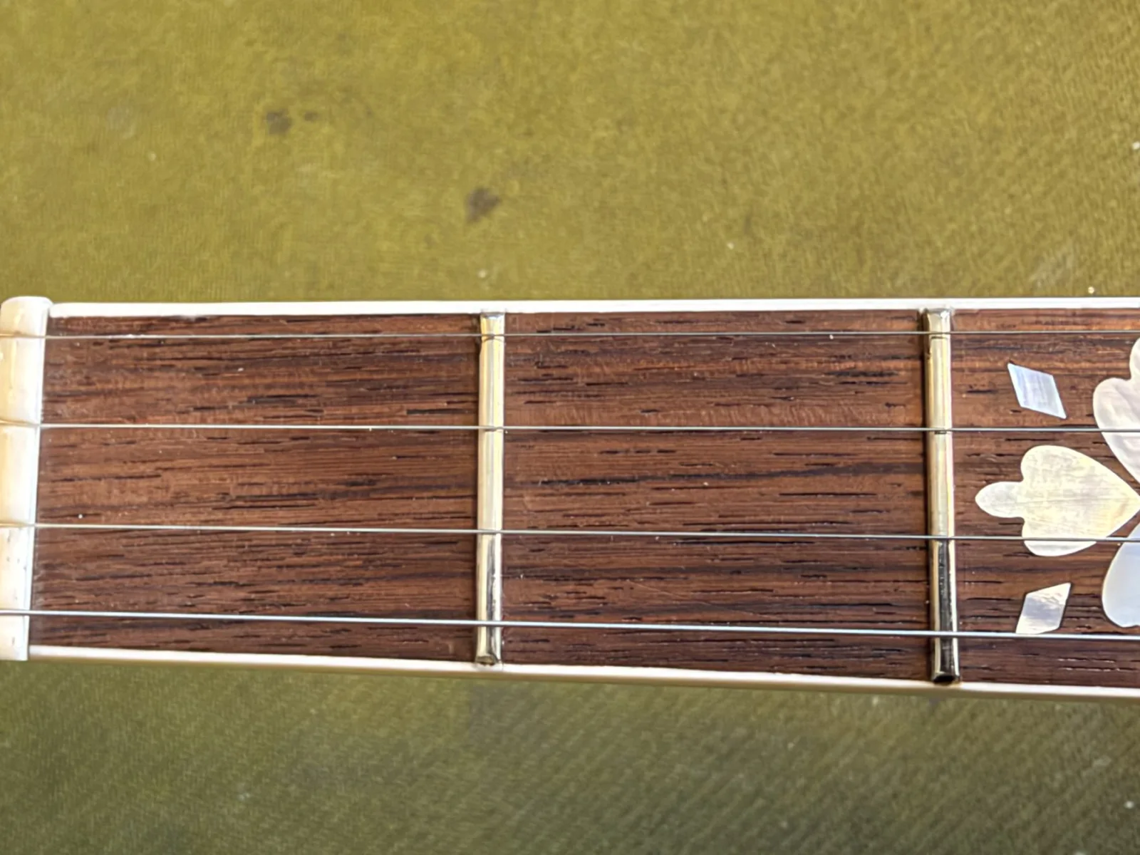 Before image of 1928 Gibson Style 4